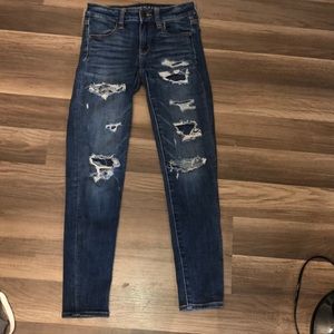 Dark blue American Eagle Jeans w/ holes